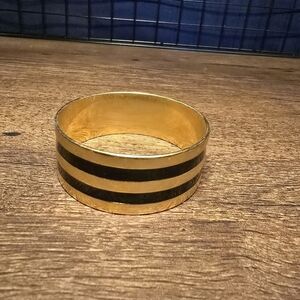 gold tone and black thick bangle bracelet